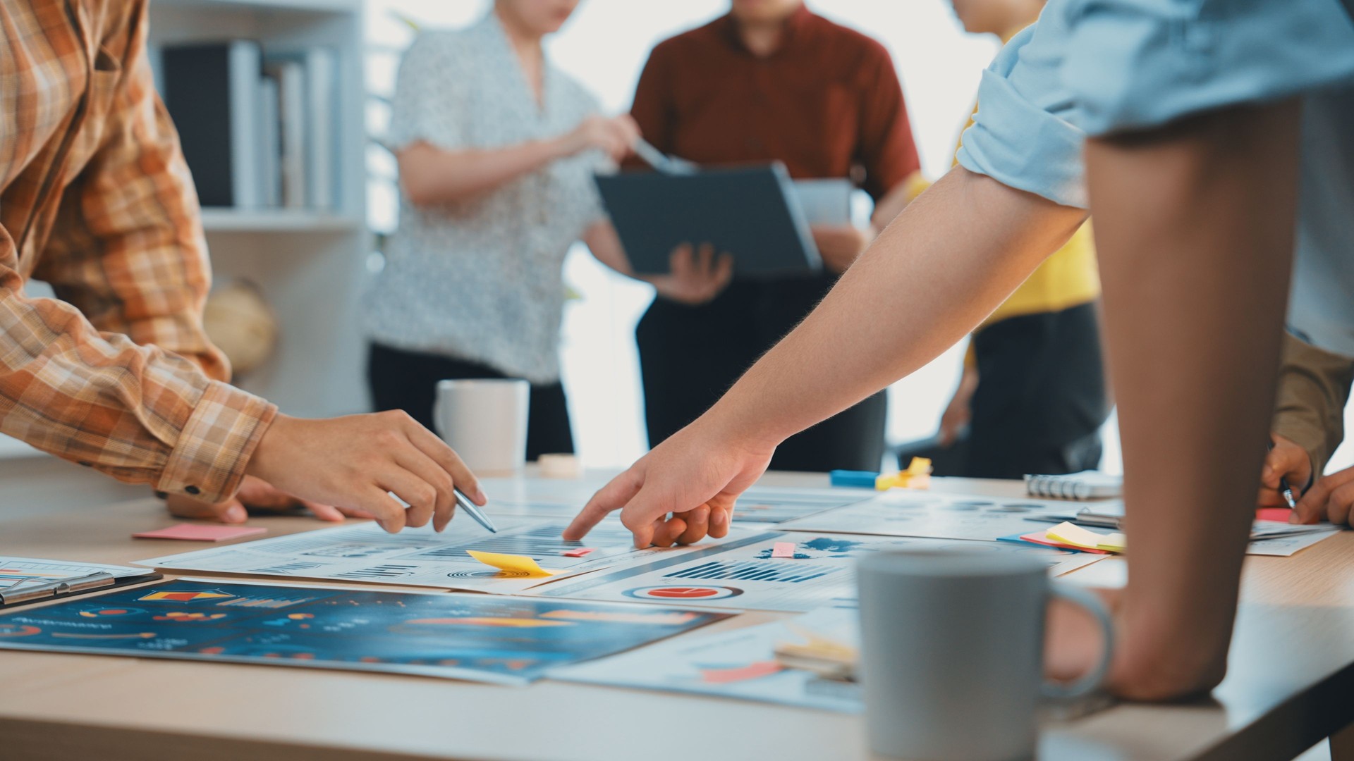 Collaborative Team Meeting with Focus on Strategy Development and Creative Planning in Bright Modern Office Environment SACTR